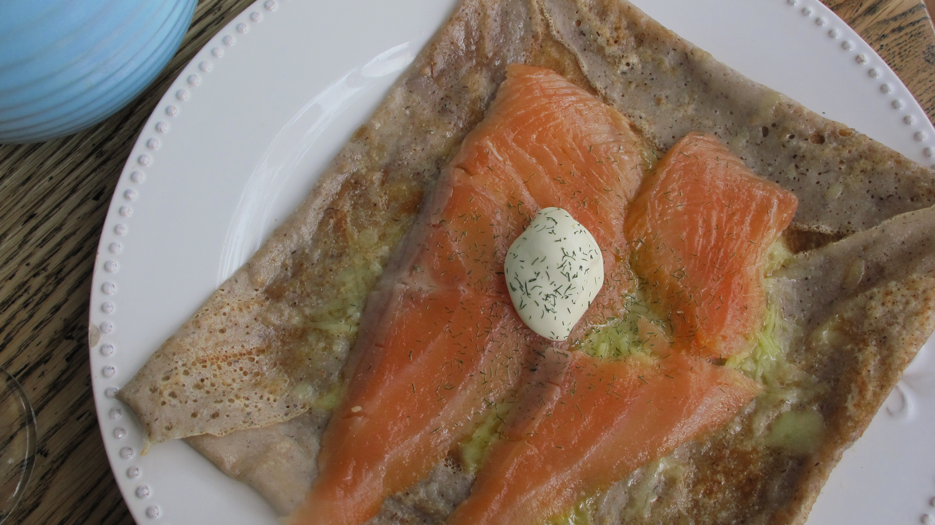 Galette with smoked salmon, cheese, creme fraiche and dill